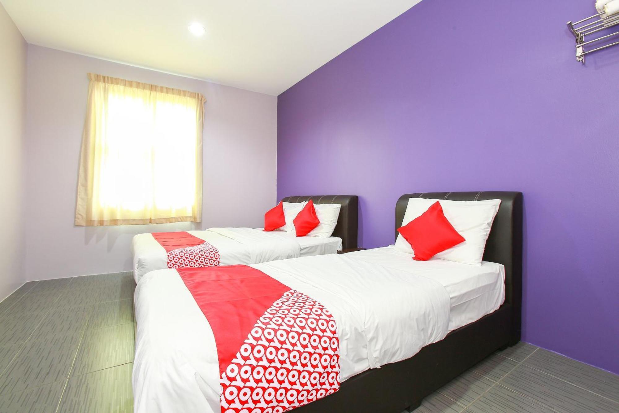 Oyo 89332 De Hotel Teluk Intan Kültér fotó